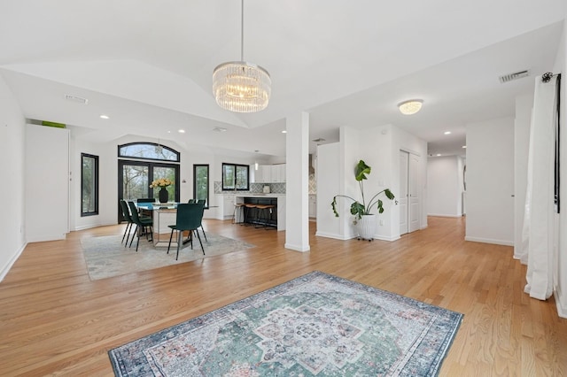 45 Nichols Rd, Huntington Station, NY 11746 - dining area featuring lofted ceiling, recessed lighting, a chandelier, visible vents, and light wood-style flooring