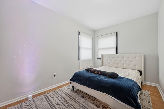 45 Nichols Rd, Huntington Station, NY 11746 - bedroom featuring baseboards and wood finished floors