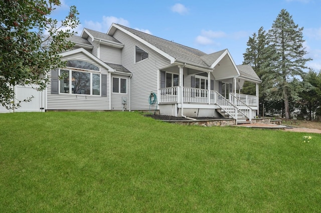 45 Nichols Rd, Huntington Station, NY 11746 - back of house with a lawn, a porch, and roof with shingles