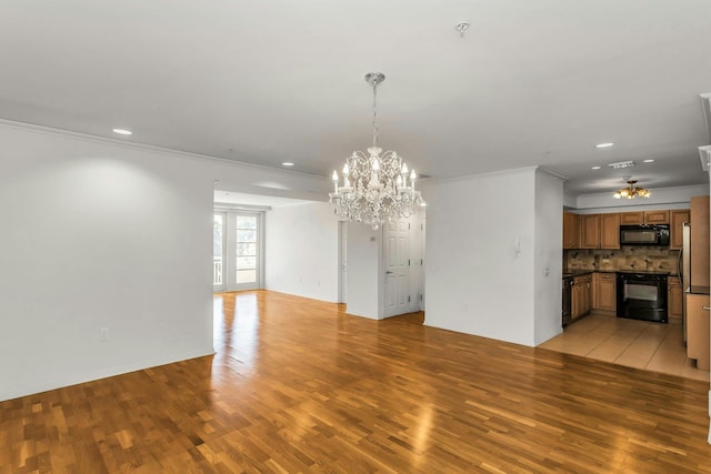 100 Harbor View Dr Unit 249, Port Washington, NY 11050 - unfurnished dining area with crown molding, recessed lighting, a notable chandelier, and light wood-style flooring