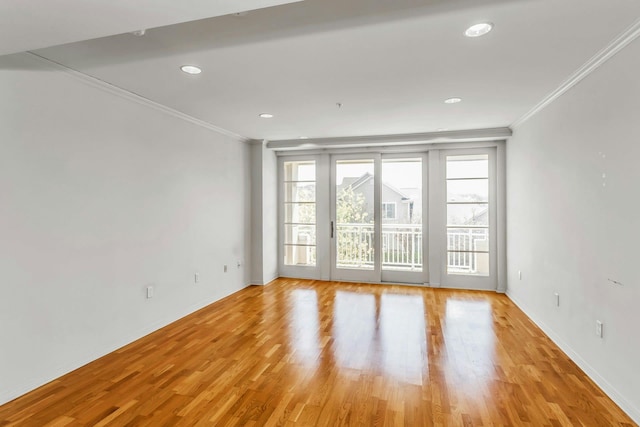 100 Harbor View Dr Unit 249, Port Washington, NY 11050 - unfurnished room with crown molding, recessed lighting, baseboards, and light wood-style flooring