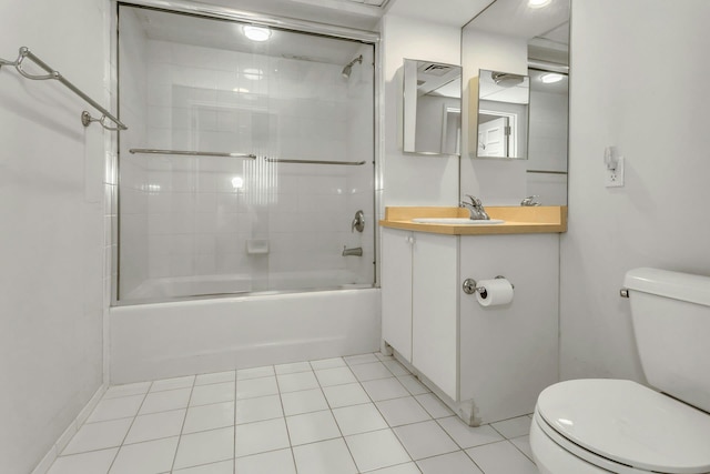 100 Harbor View Dr Unit 249, Port Washington, NY 11050 - full bath with visible vents, vanity, toilet, tile patterned floors, and combined bath / shower with glass door