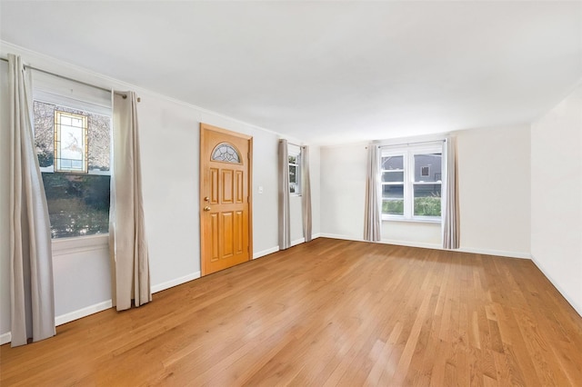 65 Hickory Ln, Bedford, NY 10506 - foyer entrance with baseboards and light wood finished floors