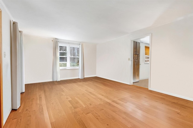 65 Hickory Ln, Bedford, NY 10506 - spare room with crown molding, baseboards, and light wood-style floors