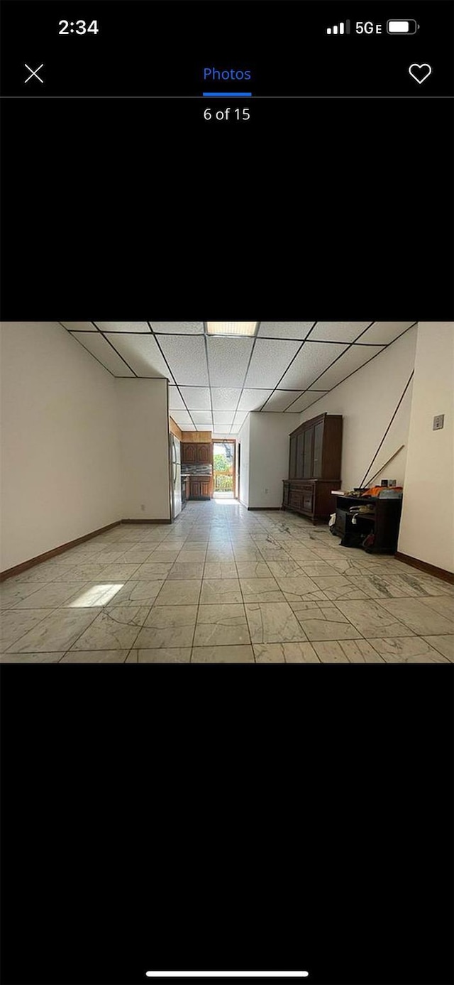 garage featuring baseboards