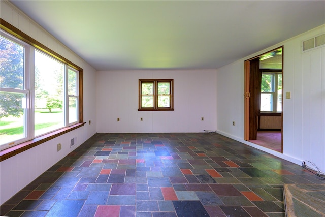 126-128 Christian Hill Rd, Dover Plains, NY 12522 - spare room with stone tile flooring and healthy amount of natural light