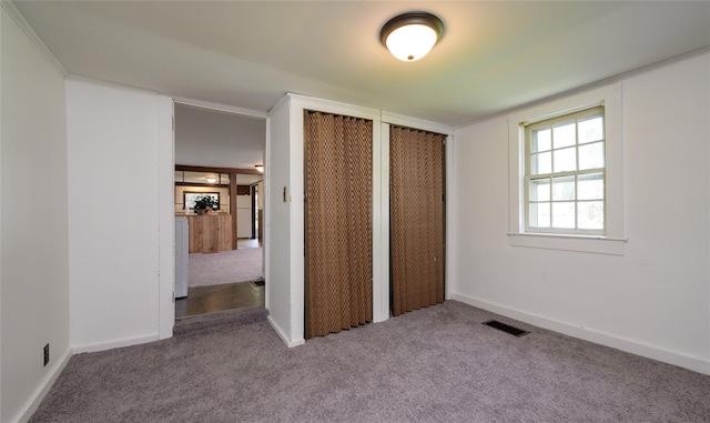 126-128 Christian Hill Rd, Dover Plains, NY 12522 - unfurnished bedroom with carpet flooring and multiple closets