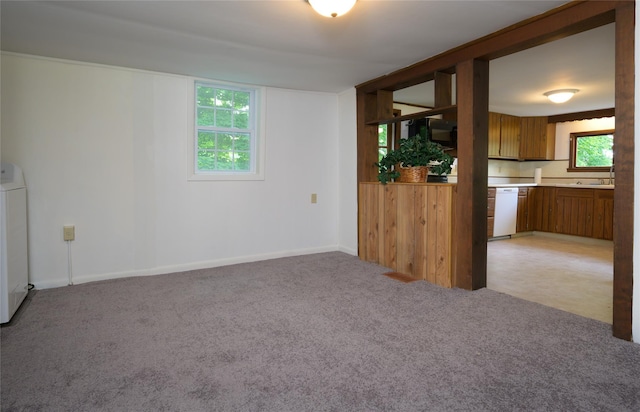 126-128 Christian Hill Rd, Dover Plains, NY 12522 - unfurnished room with light colored carpet and washer / dryer