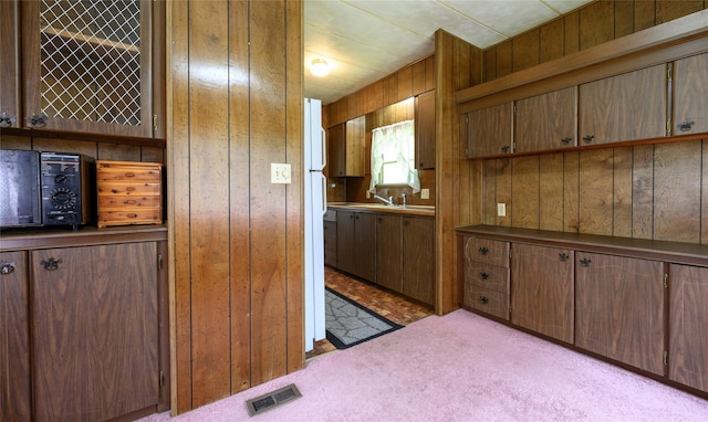 126-128 Christian Hill Rd, Dover Plains, NY 12522 - kitchen with wooden walls and carpet floors