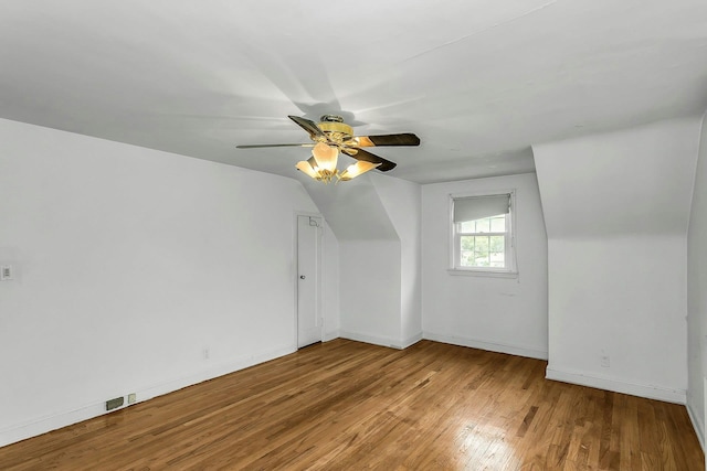 319 Maryland Ave, Freeport, NY 11520 - additional living space featuring wood finished floors, ceiling fan, and baseboards