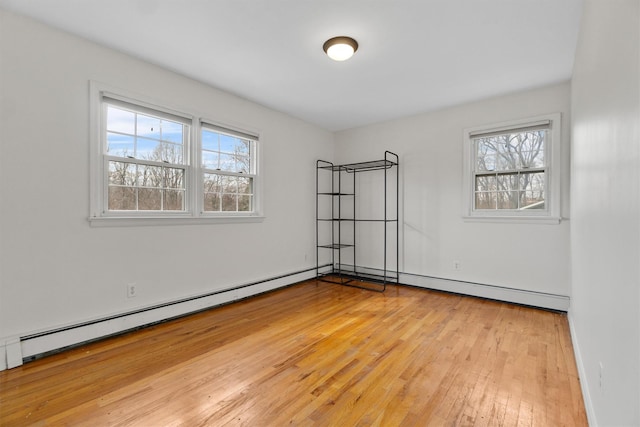 spare room with light wood finished floors