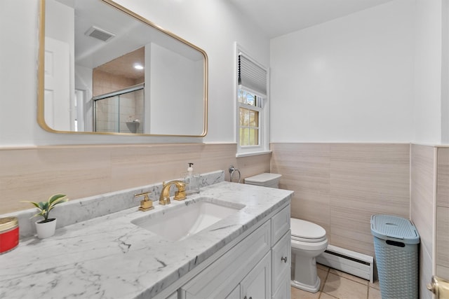 bathroom with visible vents, toilet, baseboard heating, a stall shower, and tile patterned flooring