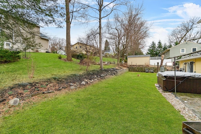 view of yard with a storage shed and an outdoor structure