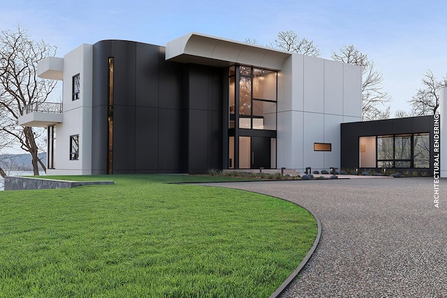 exterior space featuring stucco siding and a front lawn