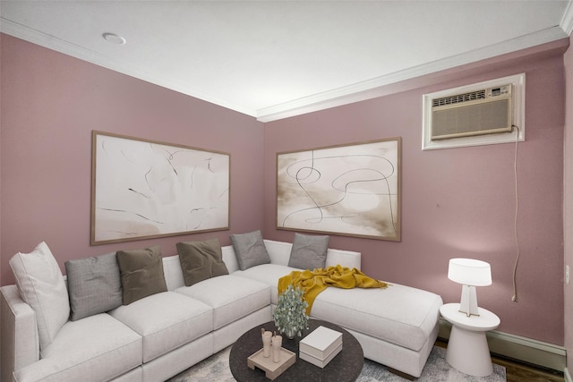 living area featuring baseboards, ornamental molding, wood finished floors, and an AC wall unit