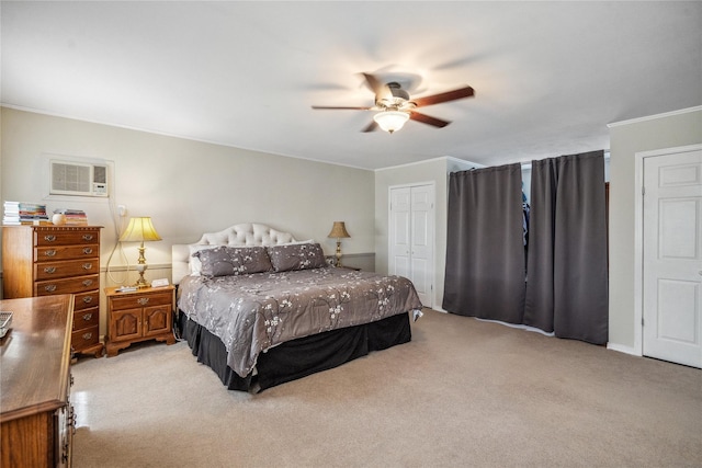 bedroom with ornamental molding, light carpet, a closet, and ceiling fan
