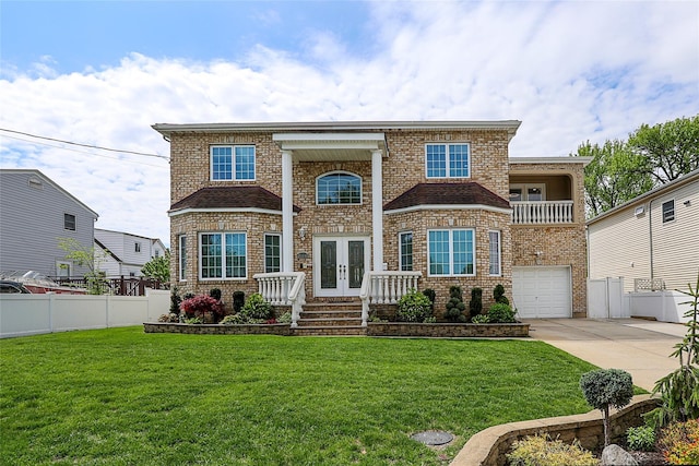 view of front of property featuring french doors, driveway, brick siding, an attached garage, and a balcony