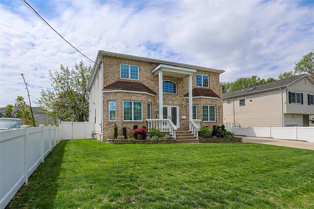 view of front of property featuring brick siding and french doors