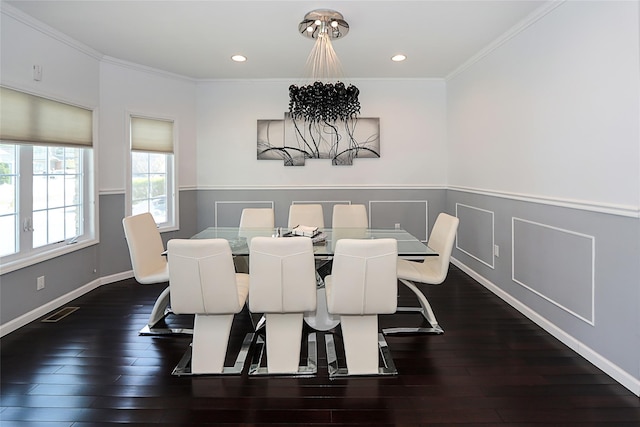 dining room featuring wainscoting, dark wood-style flooring, ornamental molding, recessed lighting, and baseboards