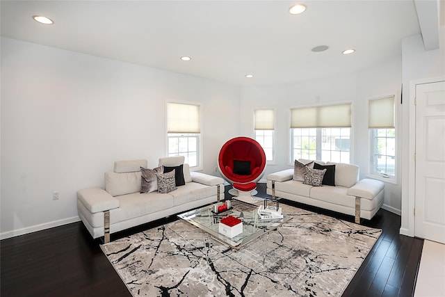 living room with recessed lighting, dark wood-style floors, and baseboards