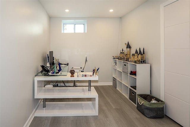 office area with wood finished floors, recessed lighting, and baseboards