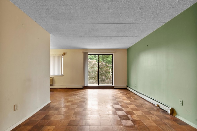 687 Bronx River Rd # 2A, Yonkers, NY 10704 - spare room with baseboard heating and a textured ceiling