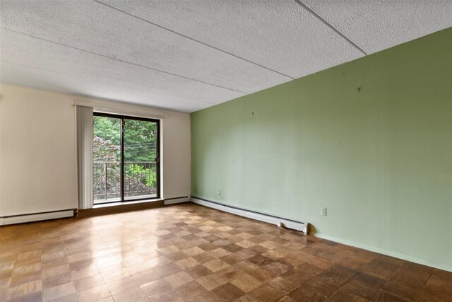 687 Bronx River Rd # 2A, Yonkers, NY 10704 - unfurnished room featuring baseboard heating, a baseboard radiator, and a textured ceiling