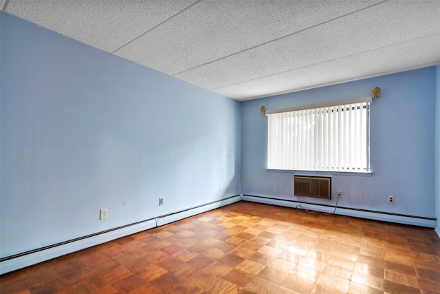 687 Bronx River Rd # 2A, Yonkers, NY 10704 - empty room featuring a textured ceiling and a baseboard radiator