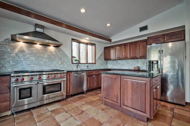 4 Sloanes Ct, Sands Point, NY 11050 - kitchen featuring vaulted ceiling, appliances with stainless steel finishes, dark countertops, wall chimney range hood, and visible vents
