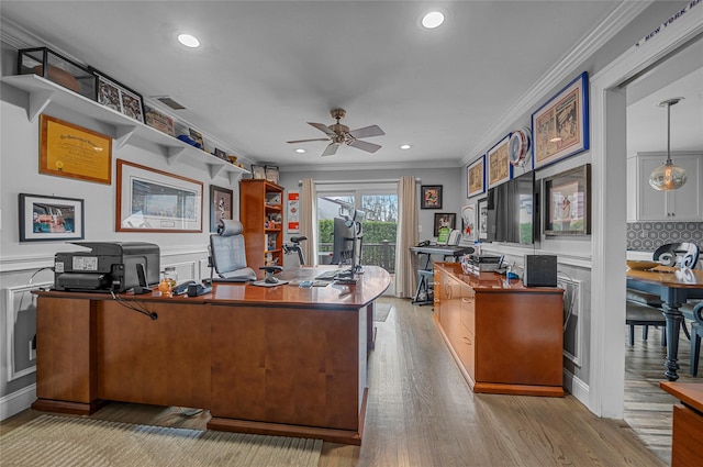 office with ornamental molding, wood finished floors, a decorative wall, ceiling fan, and recessed lighting