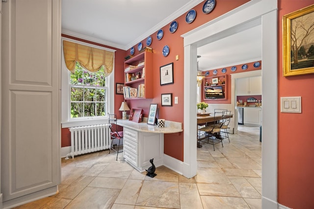 office with baseboards, built in study area, radiator heating unit, and crown molding