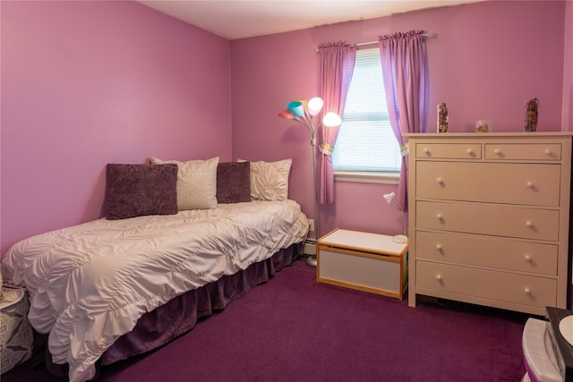 bedroom featuring dark carpet