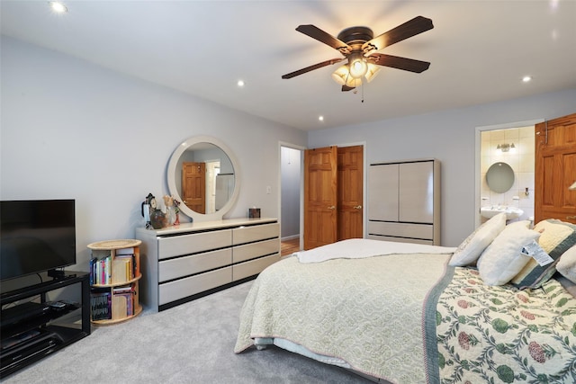 bedroom with a ceiling fan, carpet flooring, recessed lighting, and connected bathroom