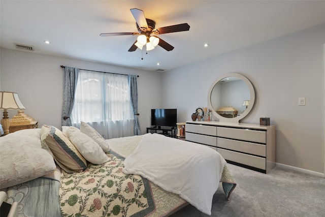 carpeted bedroom featuring visible vents, recessed lighting, baseboards, and ceiling fan