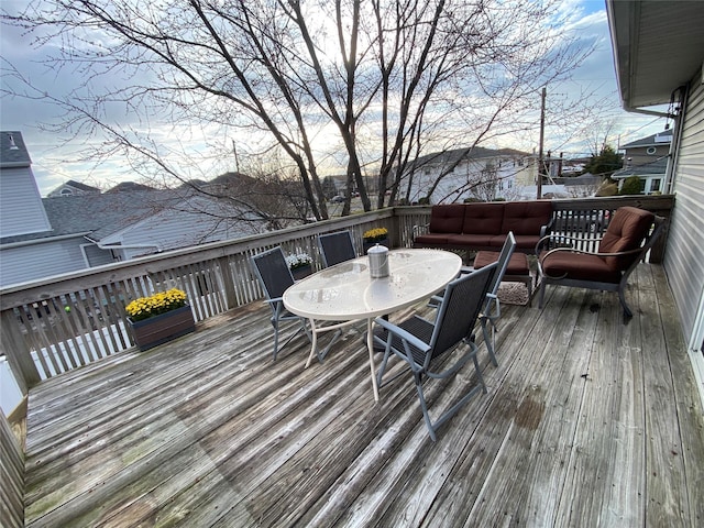4081 Massachusetts Ave, Island Park, NY 11558 - wooden deck with outdoor dining area