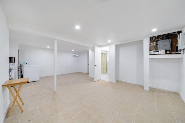 finished basement featuring baseboards and recessed lighting