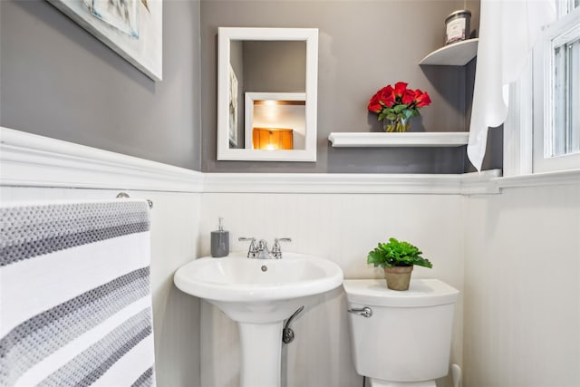 36 Seaview Ave, Northport, NY 11768 - half bathroom with toilet, wainscoting, and radiator