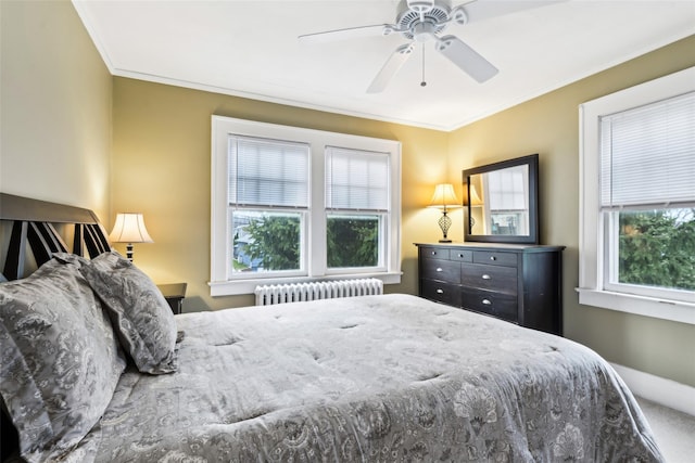 36 Seaview Ave, Northport, NY 11768 - bedroom with radiator heating unit, ornamental molding, baseboards, and ceiling fan
