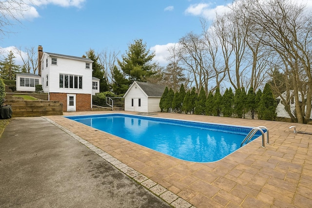 36 Seaview Ave, Northport, NY 11768 - pool featuring fence, an outdoor structure, and a patio area