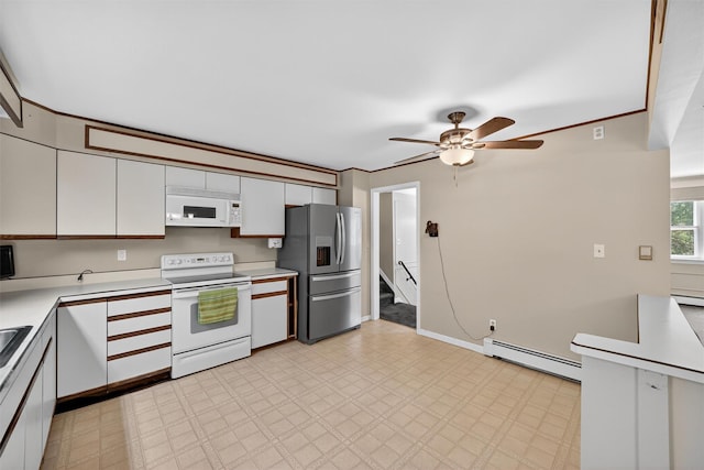 21 Hillside Rd, Slate Hill, NY 10973 - kitchen featuring white appliances, a baseboard radiator, light countertops, and ceiling fan