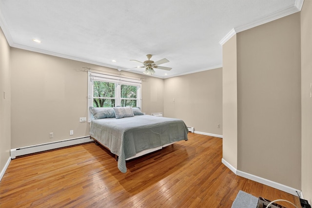 21 Hillside Rd, Slate Hill, NY 10973 - bedroom featuring a baseboard heating unit, ornamental molding, light wood-style flooring, a ceiling fan, and recessed lighting