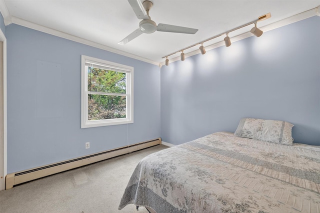 21 Hillside Rd, Slate Hill, NY 10973 - carpeted bedroom featuring baseboard heating, rail lighting, ornamental molding, and ceiling fan