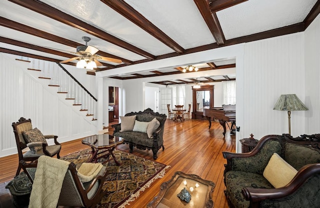 430 Montauk Hwy, East Moriches, NY 11940 - living area with beam ceiling, ceiling fan, wood finished floors, and stairs