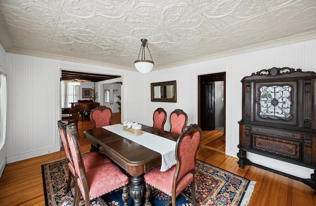 430 Montauk Hwy, East Moriches, NY 11940 - dining space featuring wood finished floors and an ornate ceiling