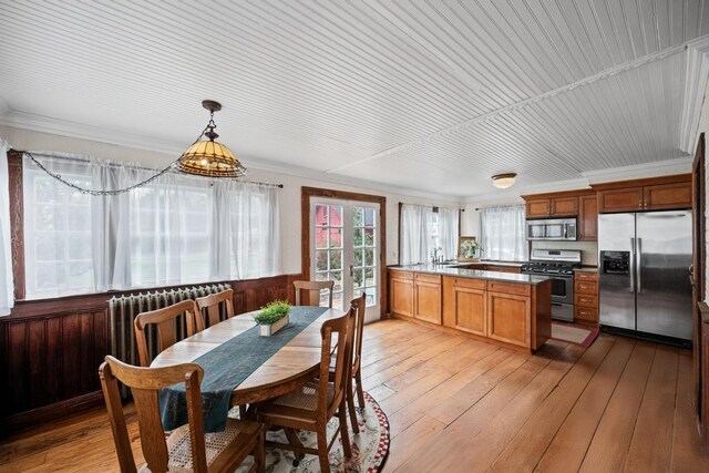430 Montauk Hwy, East Moriches, NY 11940 - dining area with light wood finished floors and crown molding