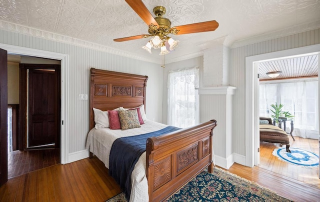 430 Montauk Hwy, East Moriches, NY 11940 - bedroom featuring an ornate ceiling, ornamental molding, baseboards, and wood finished floors
