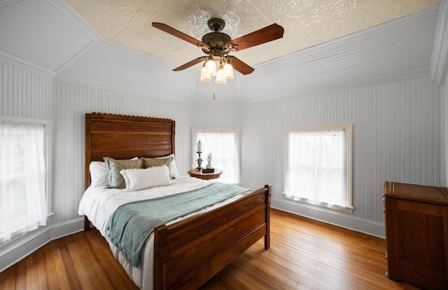 430 Montauk Hwy, East Moriches, NY 11940 - bedroom with baseboards, a ceiling fan, and hardwood / wood-style floors