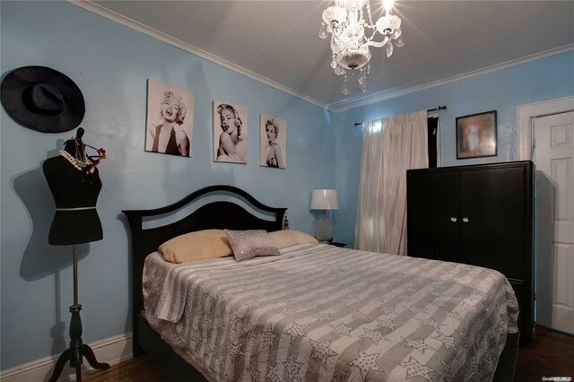 78-17 95th Ave, Ozone Park, NY 11416 - bedroom with crown molding, baseboards, a chandelier, and wood finished floors