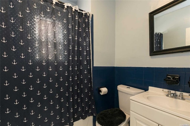78-17 95th Ave, Ozone Park, NY 11416 - bathroom featuring tile walls, vanity, a wainscoted wall, and curtained shower