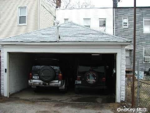 78-17 95th Ave, Ozone Park, NY 11416 - garage featuring driveway